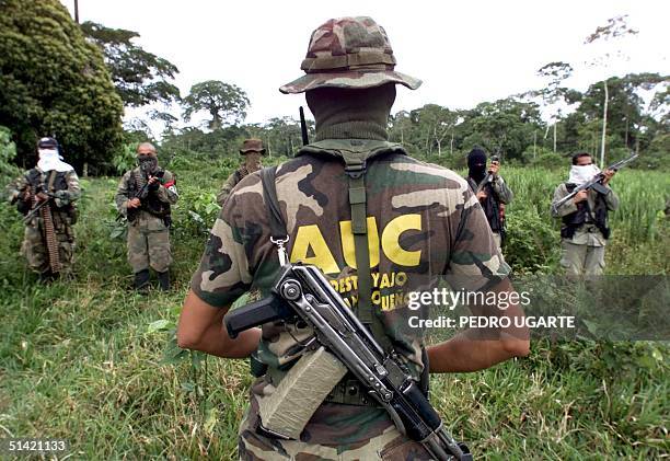 Troops from the Autodefense Forces of Colombia paramilitary group train in the El Placer area of Putumayo 22 October, 2000. The Revolutionary Armed...