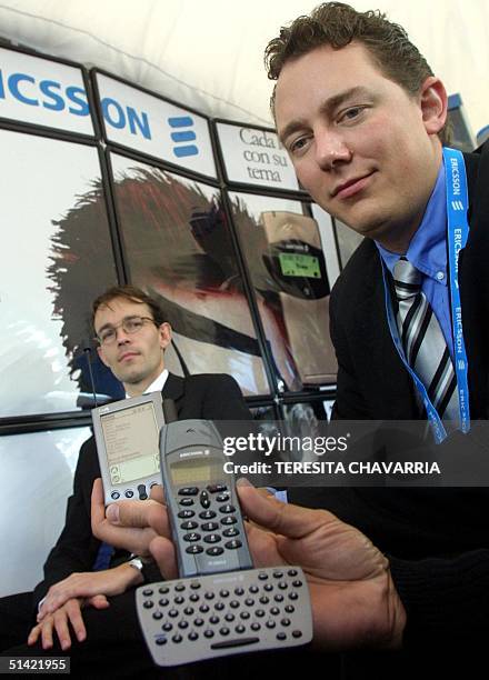 Fredrick Engstromer vice-president of Ericsson for Central America shows Ericsson accessories, acompanadied by consulatant Peter Frick 08 December...