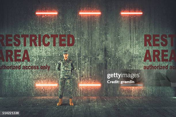 soldier guarding restricted military area - military base stock pictures, royalty-free photos & images