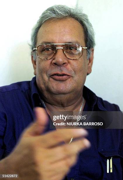 Raul Rivero, dissident poet and director of Agency Cuba-Press, speaks during a press conference in Havana on the newly-founded Manuel Marquez...