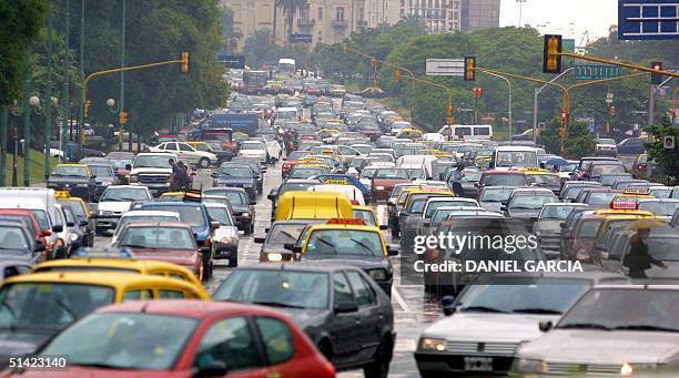 Cars jam the streets in Buenos Aires, 13 December, 2001 during a general strike called to protest a severe economic austerity plan implemented by...