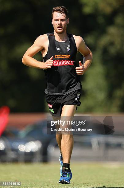 Matt Scharenberg of the Magpies jogs during a Collingwood Magpies AFL training session at Olympic Park on March 8, 2016 in Melbourne, Australia.