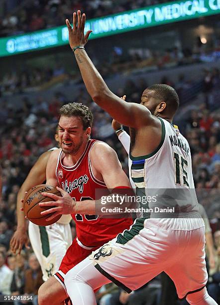 Pau Gasol of the Chicago Bulls drives against Greg Monroe of the Milwaukee Bucks on his way to a triple-double at the United Center on March 7, 2016...
