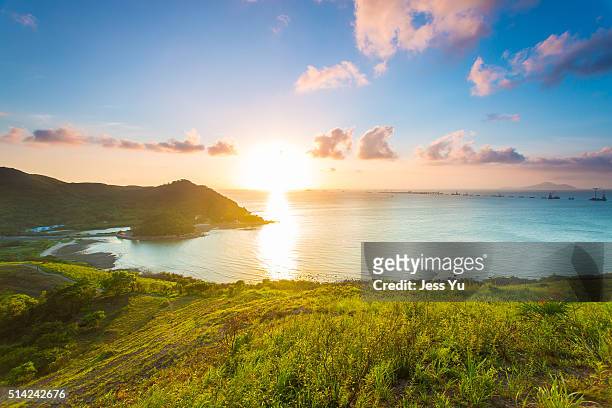 sunset coast at tai o, hong kong. - sea cliff stock pictures, royalty-free photos & images