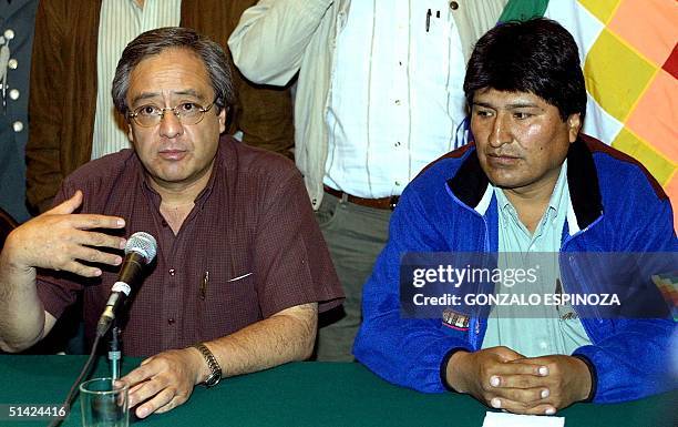 The minister of the interior of Bolivia, Alberto Gasser next to the representative of the peasant coca producers and representative Evo Morales,...