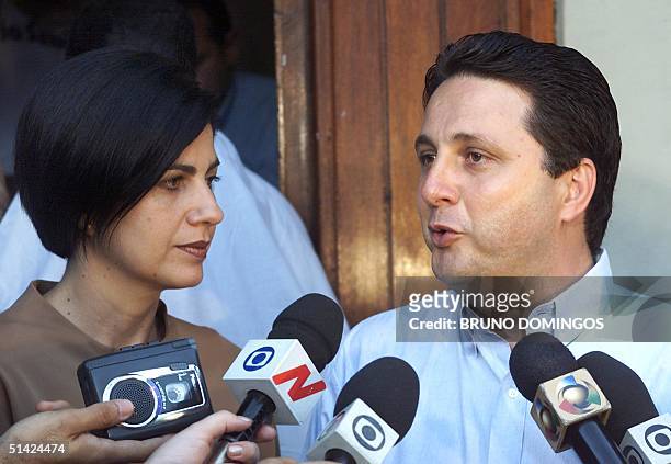 Anthony Garotinho and his wife, Rosinha Garotinho, speak to the press outside of their house in Rio de Janeiro, 07 October 2002. Antony Garotinho...
