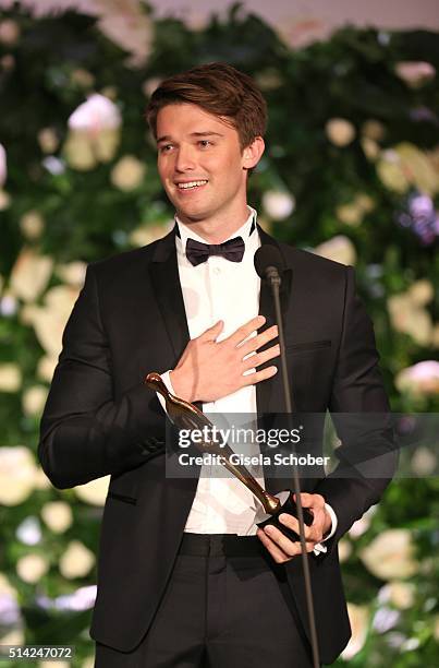 Patrick Schwarzenegger with award during the PEOPLE Style Awards at Hotel Vier Jahreszeiten on March 7, 2016 in Munich, Germany.