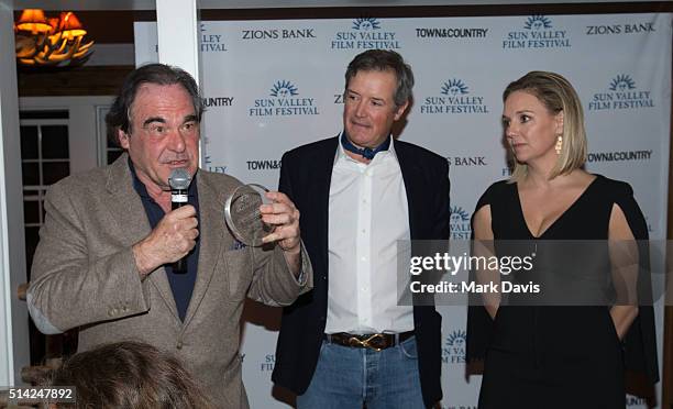 Director Oliver Stone, Sun Valley Film Festival Executive Director Teddy Grennan and Sun Valley Film Festival Director Candice Pate attend the Vision...