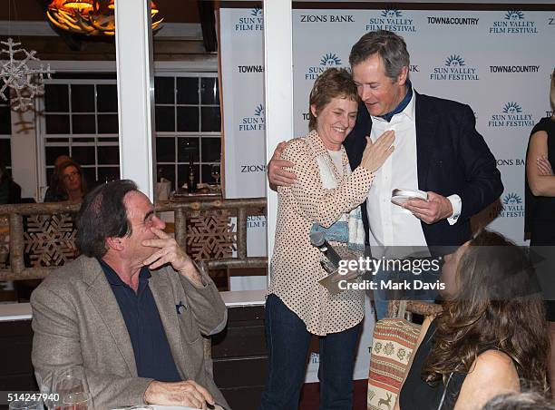 Director Oliver Stone, actress Melissa Leo and Sun Valley Film Festival Executive Director Teddy Grennan attend the Sun Valley Vision award dinner on...