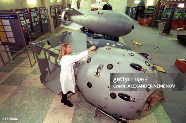 Nuclear museum staffer cleans, 19 October the first Soviet nuclear bomb, tested in 1949 in Sarov . Sarov, a town of some 84,000 inhabitants,...