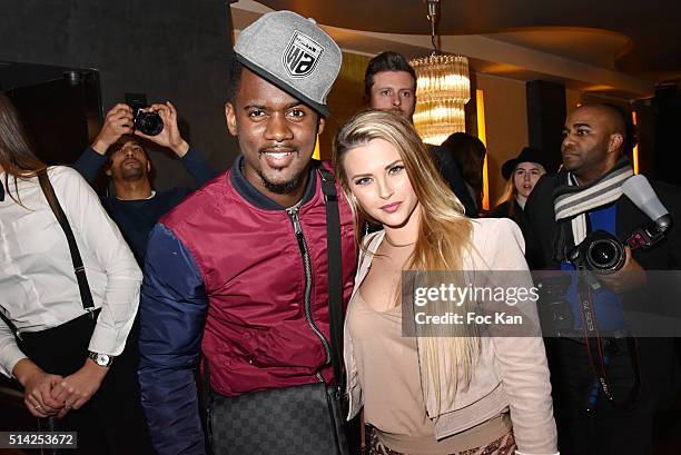 Kelly Vedovelli and a rap artist attend the 'M.Georges Restaurant' : Opening Party - Paris Fashion Week Womenswear Fall/Winter 2016/2017 on March 7,...