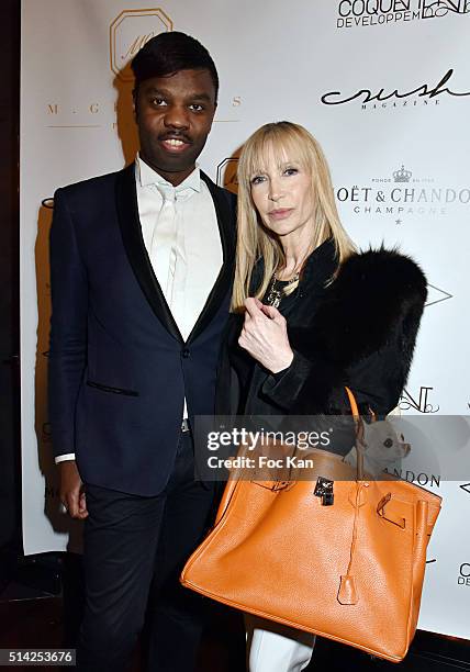 Presenter Patricia Charpentier, her dog Iti and Jean Barthelemy Bokassa attend the 'M.Georges Restaurant' : Opening Party - Paris Fashion Week...