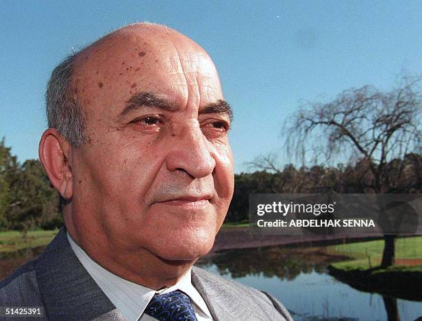 Morocco's new socialist prime minister, Abderrahamane Youssoufi, poses for photos in a park in Rabat 26 February. Yousoufi will unveil his cabinet...