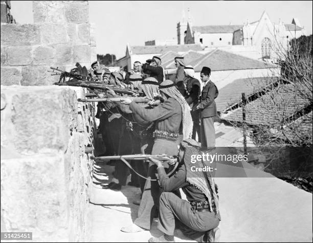 The soldiers of allied Arab Legion forces fire, 06 March 1948 from East sector of Jerusalem on Jewish fighters of the Haganah, the Jewish Agency...