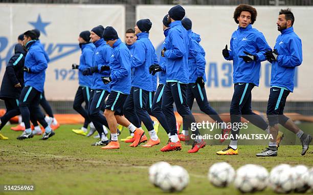 Zenit' Axel Witsel and Danny (R take part with teammates in a training session on March 8, 2016 in St. Petersburg on the eve of the second-leg round...