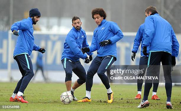 Zenit's Axel Witsel and Danny take part with teammates in a training session on March 8, 2016 in St. Petersburg on the eve of the second-leg round of...
