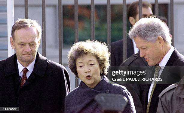 Canadian Prime Minister Jean Chretien, newly appointed Governor General Adrienne Clarkson, and US President Bill Clinton walk together prior to the...
