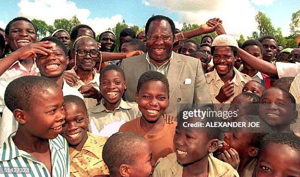 Malawi President-elect Bakili Muluzi , leader of the Malawan United Democratic Front , is surrounded by supporters, 18 May 1995, in Blantyre....