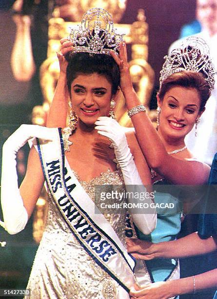 The new Miss Universe Sushmita Sen of India is crowned by outgoing Miss Univers Dayanara Torres 21 May 1994, Phillipine. Sen, an 18-year-old model...