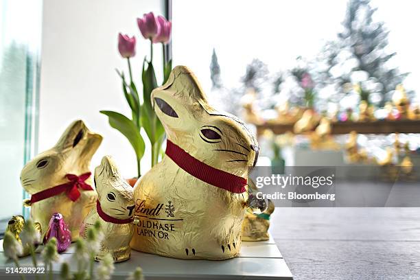 Chocolate bunnies, produced by Lindt & Spruengli AG, sit on display during a news conference to announce the company's full year results in Zurich,...