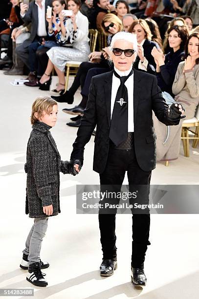Karl Lagerfeld and his godson Hudson Kroenig pose on the runway during the Chanel show as part of the Paris Fashion Week Womenswear Fall/Winter...