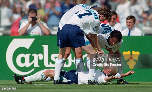 England goalscorer Paul Gascoigne celebrates in the 'Dentists Chair' with Steve McManaman Alan Shearer and Jamie Redknapp during the 1996 European...