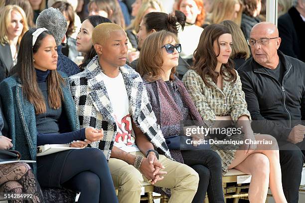 Helen Lasichanh, Pharrell Williams, Isabelle Huppert and Anna Mouglalis attend the Chanel show as part of the Paris Fashion Week Womenswear...