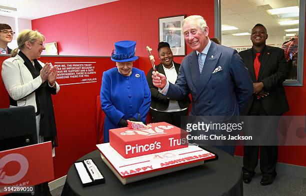 Of the Prince's Trust Martina Milburn claps as Queen Elizabeth II and Prince Charles, Prince of Wales cut a 40th Anniversary cake at the Prince's...