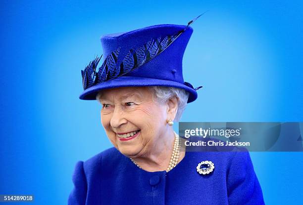 Queen Elizabeth II smiles as she meets people being helped by the Prince's Trust at the Prince's Trust Centre in Kennington on March 8, 2016 in...