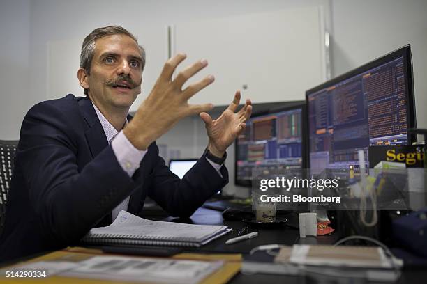 Carmelo Haddad, managing director of Knossos Asset Management, speaks during an interview in the company's offices in Caracas, Venezuela, on...