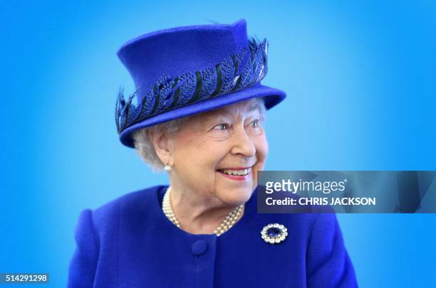 Britain's Queen Elizabeth II smiles as she meets people being helped by the Prince's Trust at the Prince's Trust Centre in Kennington, London, on...