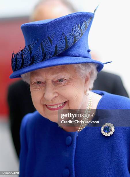 Queen Elizabeth II smiles as she meets people being helped by the Prince's Trust at the Prince's Trust Centre in Kennington on March 8, 2016 in...