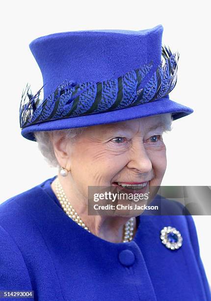 Queen Elizabeth II smiles as she meets people being helped by the Prince's Trust at the Prince's Trust Centre in Kennington on March 8, 2016 in...