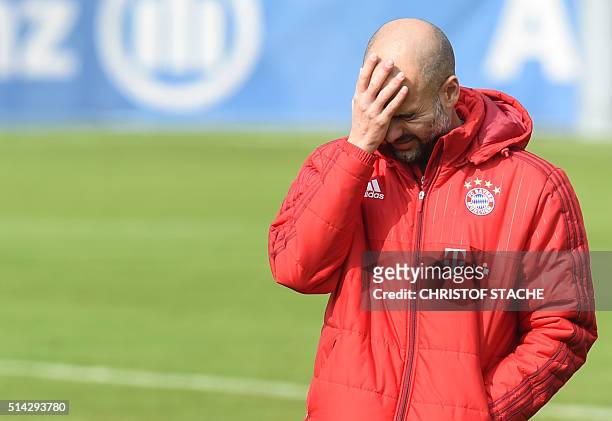 Bayern Munich's Spanish head coach Pep Guardiola gestures during a training session of the German first division Bundesliga team in Munich, southern...