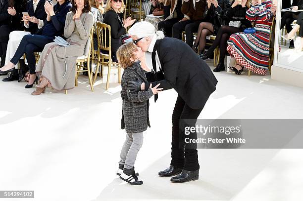 Designer Karl Lagerfeld and his godson Hudson Kroenig walk the runway during the Chanel show as part of the Paris Fashion Week Womenswear Fall/Winter...