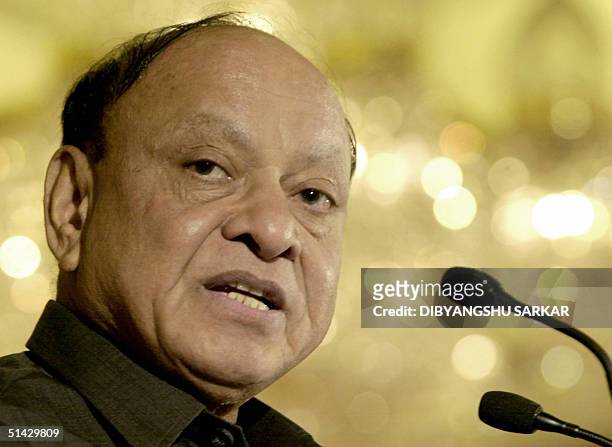 Indian Textiles Minister Shankar Singh Vaghela delivers a speech as he inaugurates an international jewellery convention in Madras 06 October 2004....