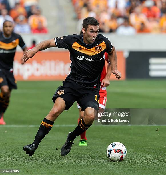 Will Bruin of Houston Dynamo controls the ball against the New England Revolution at BBVA Compass Stadium on March 6, 2016 in Houston, Texas.