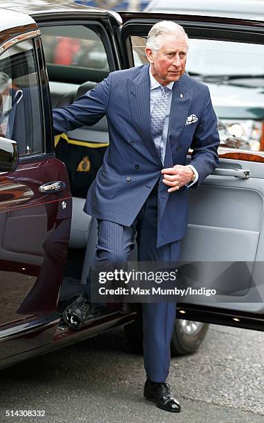 Prince Charles, Prince of Wales steps out of Queen Elizabeth II's Bentley car as they visit The Prince's Trust Centre in Kennington to mark the 40th...