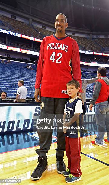 Alexis Ajinca of the New Orleans Pelicans attends a season ticket holder event on March 6, 2016 at the Smoothie King Center in New Orleans,...