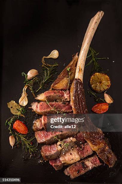 prime rib steak - tomahawk stock pictures, royalty-free photos & images