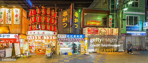 japan neon nightlife colourful fast food restaurants panorama shinsekai osaka - osaka shinsekai food stock pictures, royalty-free photos & images