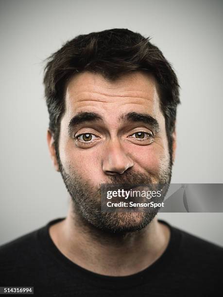 portrait of a caucasian real young man - raised eyebrows stock pictures, royalty-free photos & images