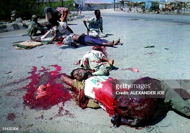 Somali victims lie in the street 13 June after Pakistani United Nations peace-keeping forces opened fire on demonstrators. Seven Somalis were killed,...