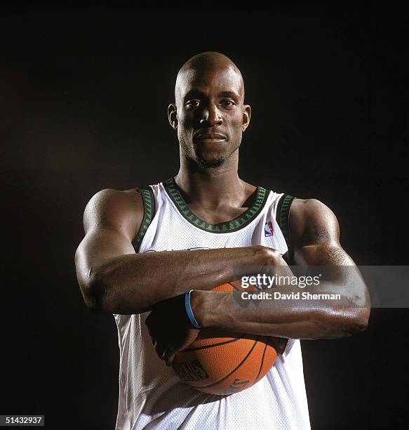 Kevin Garnett of the Minnesota Timberwolves poses for a portrait during NBA Media Day on October 4, 2004 in Minneapolis, Minnesota. NOTE TO USER:...