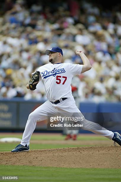 September 12: Pitcher Scott Stewart of the Los Angeles Dodgers winds up for the pitch during the game against the St. Louis Cardinals at Dodger...