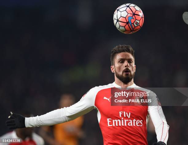 Arsenal's French striker Olivier Giroud chases the ball during the English FA cup fifth round replay football match between Hull City and Arsenal at...