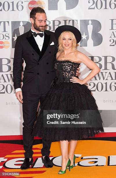 Joshua Sasse and Kylie Minogue attend the BRIT Awards 2016 at The O2 Arena on February 24, 2016 in London, England.