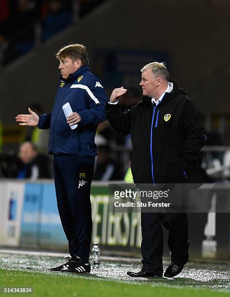 Leeds manager Steve Evans and his assistant Paul Raynor react during the Sky Bet Championship match between Cardiff City and Leeds United at Cardiff...