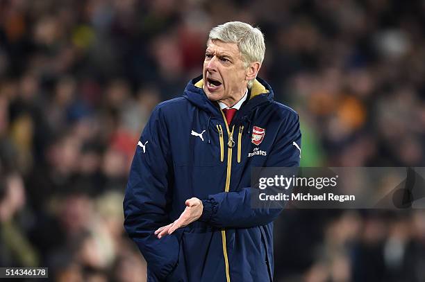 Arsene Wenger, Manager of Arsenal reacts during the Emirates FA Cup Fifth Round Replay match between Hull City and Arsenal at KC Stadium on March 8,...