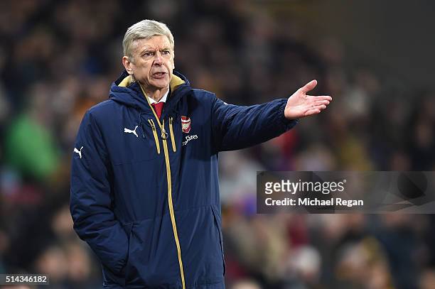 Arsene Wenger, Manager of Arsenal reacts during the Emirates FA Cup Fifth Round Replay match between Hull City and Arsenal at KC Stadium on March 8,...